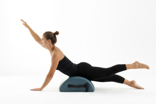 Half circle prop can be used as part of a Pilates workout