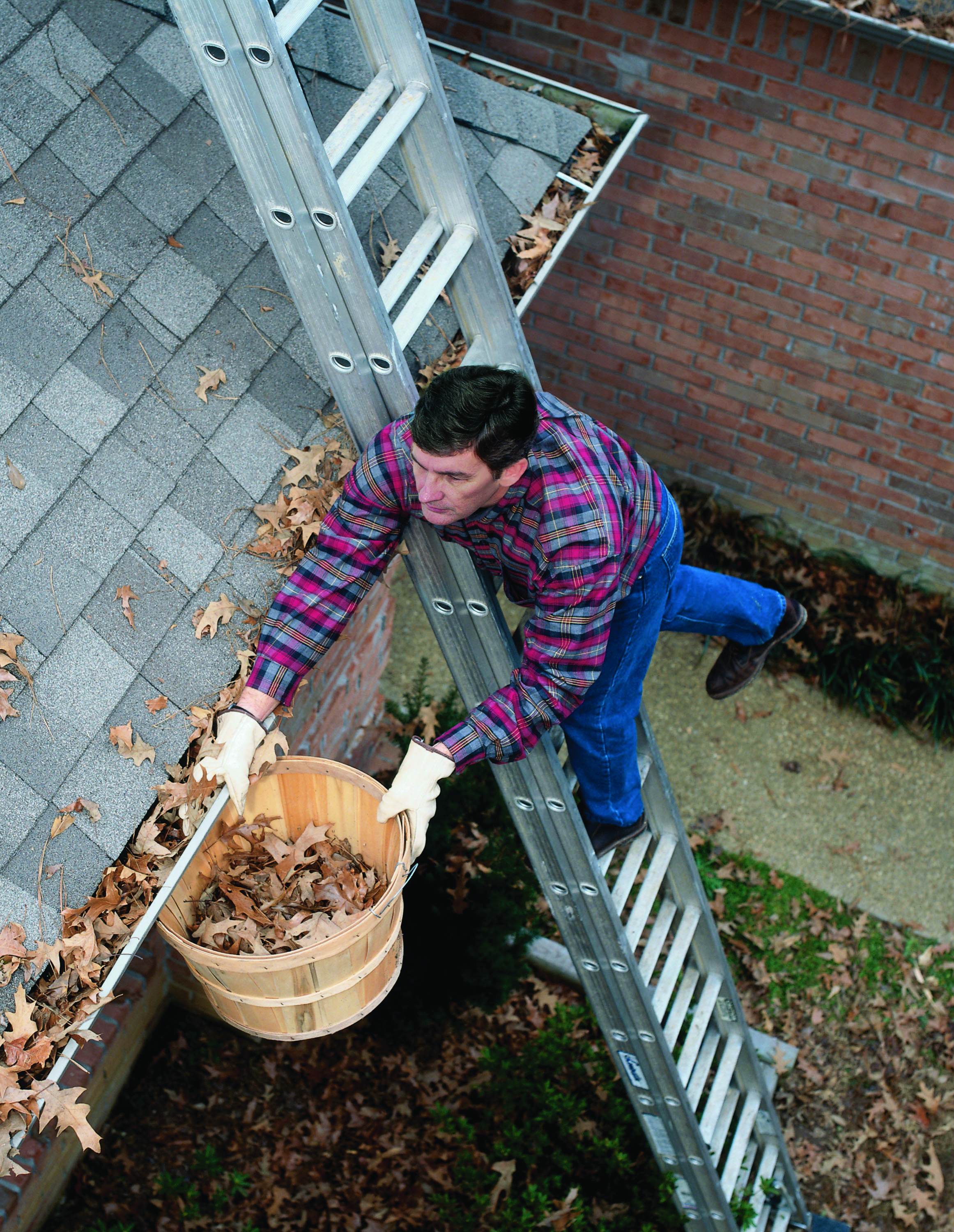 How To Clean Your Gutters Without Climbing A Ladder Asher Lasting Exteriors