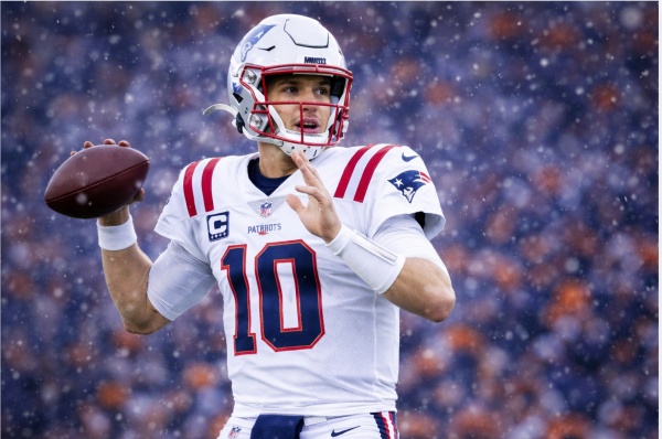 Mac Jones throws pass in snow for New England Patriots