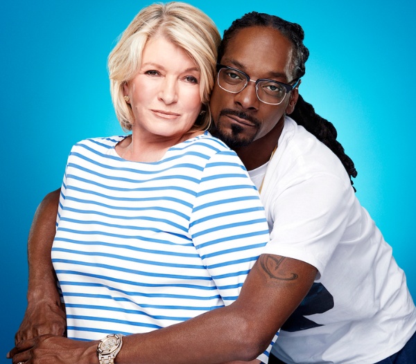 Martha Stewart and Snoop Dogg hugging closely on blue background