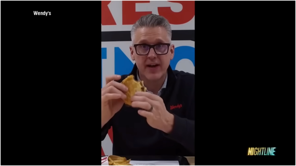 Wendy's Executive Eating Burger on Nightline Interview