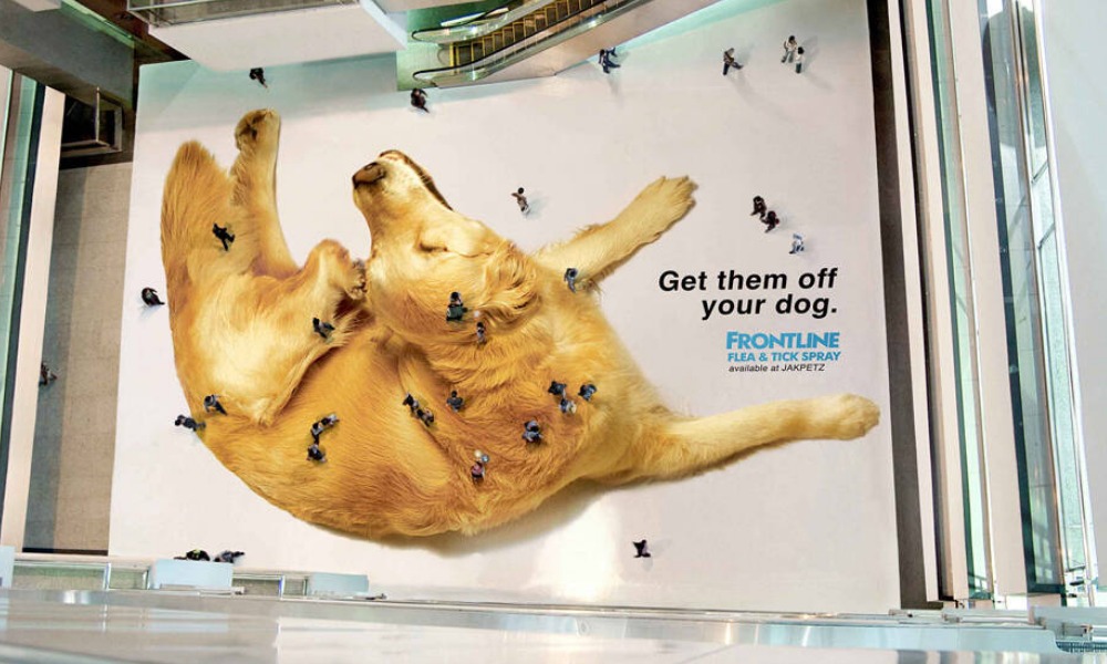 Frontline Flea and Tick floor ad with people appearing as fleas on dog