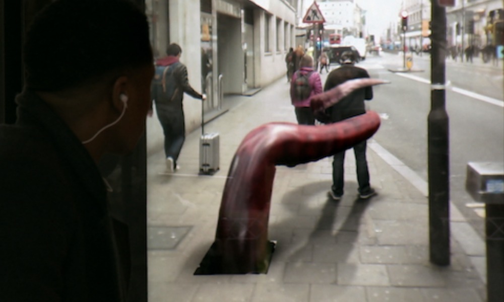 Pepsi Max augmented reality bus shelter ad with giant tentacle on street