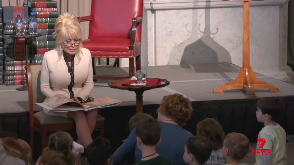 Dolly Parton reading to children.