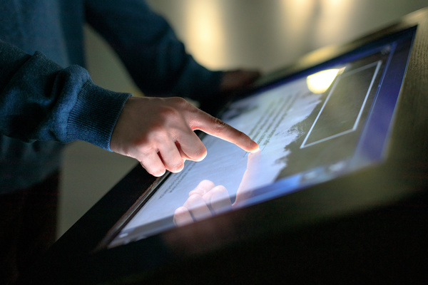 customer experience - Typing on a computer screen.