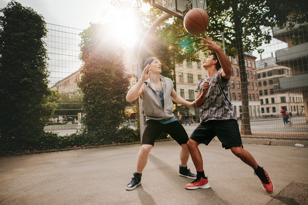 men playing basketball