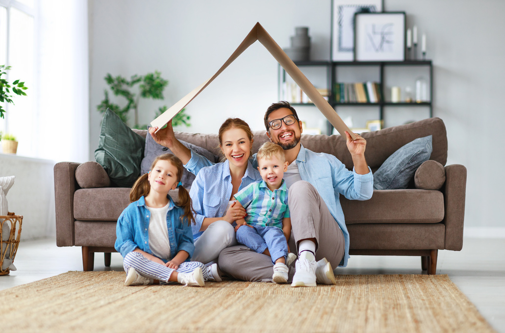 Family forming a home shape.