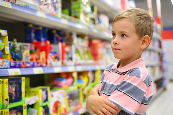 Boy shopping for toys.