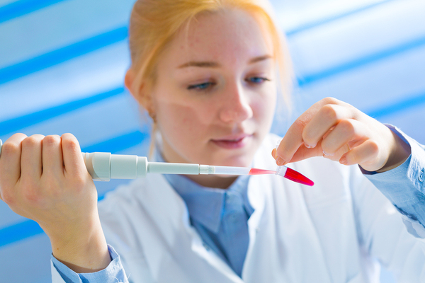 Woman in a lab.