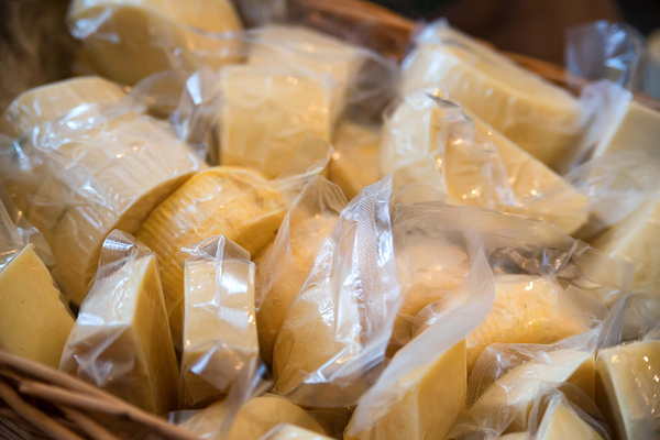 Cheese in plastic wrap.