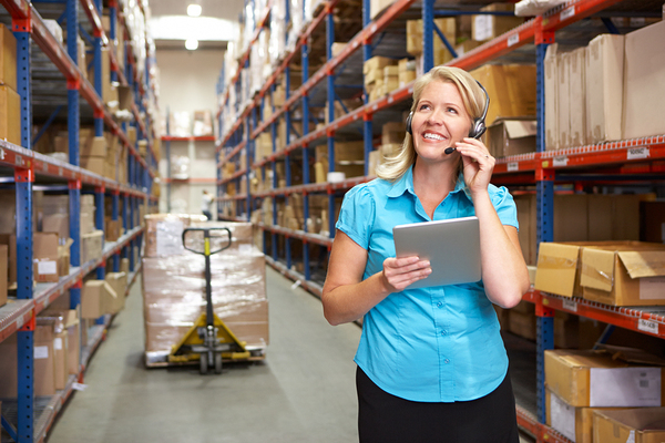 Woman working in a warehouse.