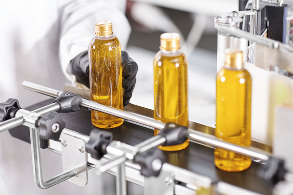 Three bottles of amber liquid.