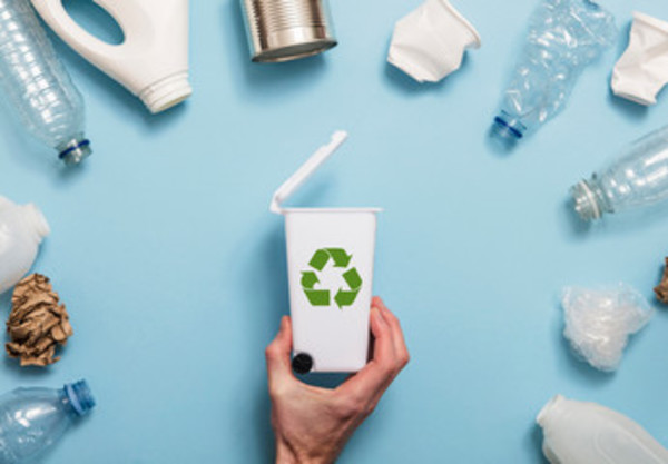 Recycling symbol on plastic bin.