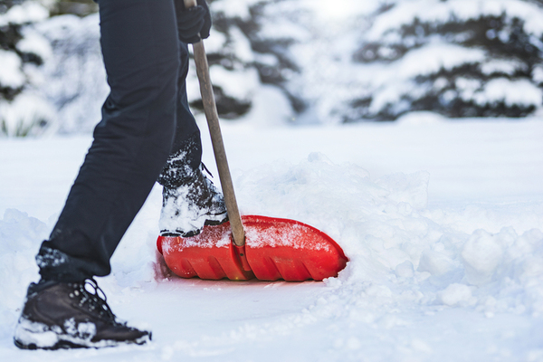 Person shoveling snow.