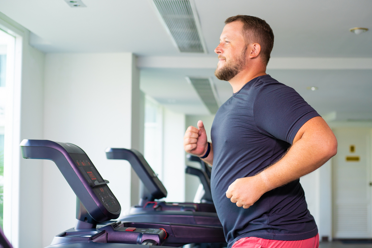 Man running on a treadmill.