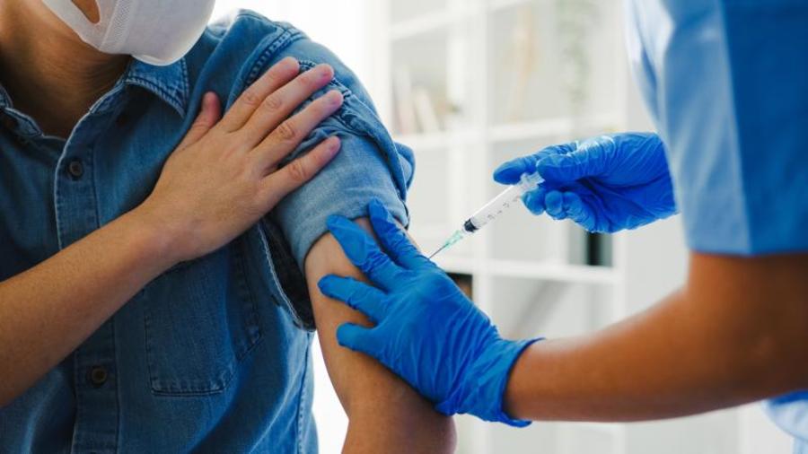 Getting a COVID-19 shot.