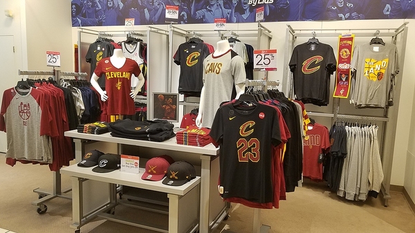CAVs shop with shirts and hats on display.