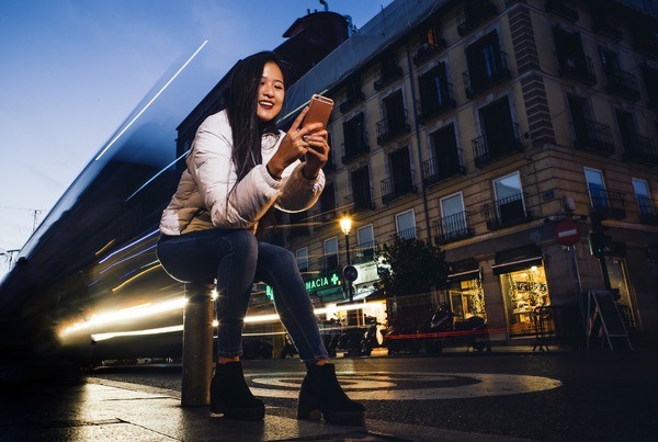 Woman looking at her phone.