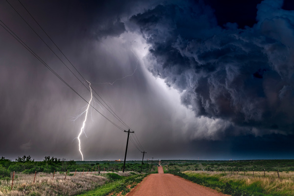 Lightning strike in a field. Risk assessment in insurance