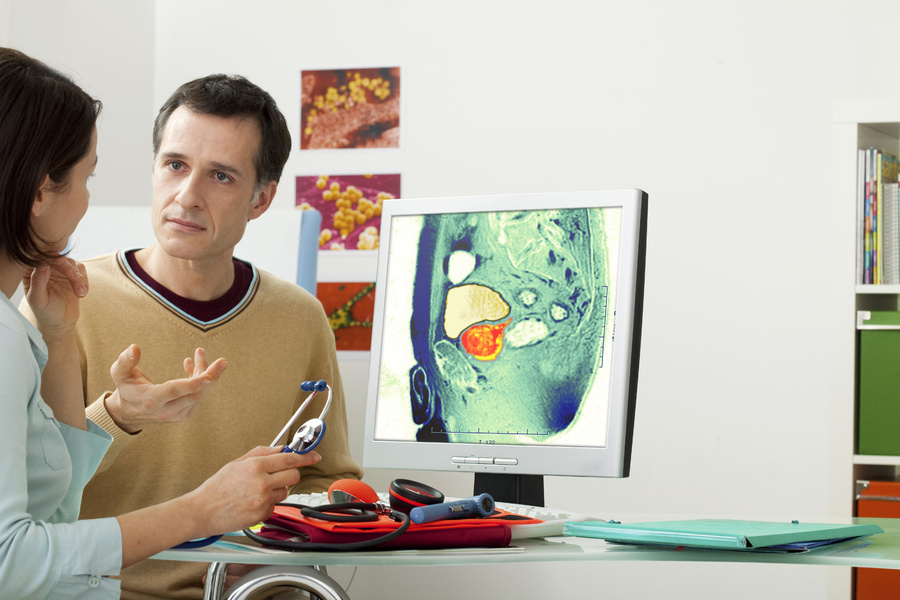 Medical doctor having a discussion with a patient.