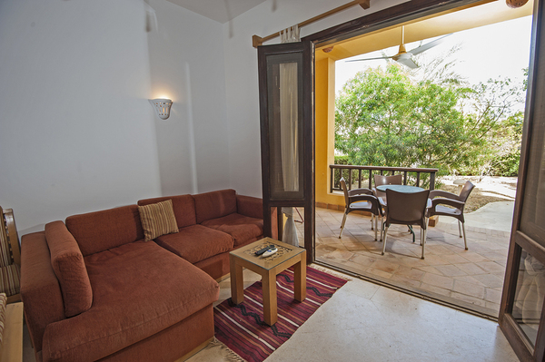 Outside patio with chairs and table.