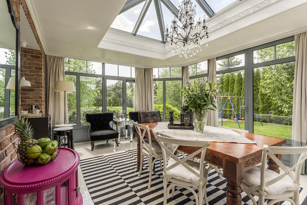 Beautiful covered patio with all glass walls.