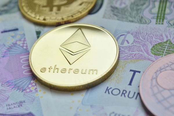 Gold coin with ethereum symbol.
