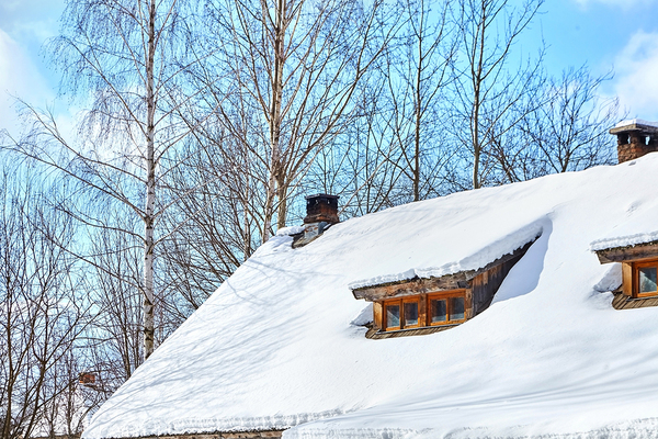 Home with snow on the roof.