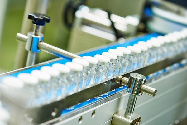 bottles on production line