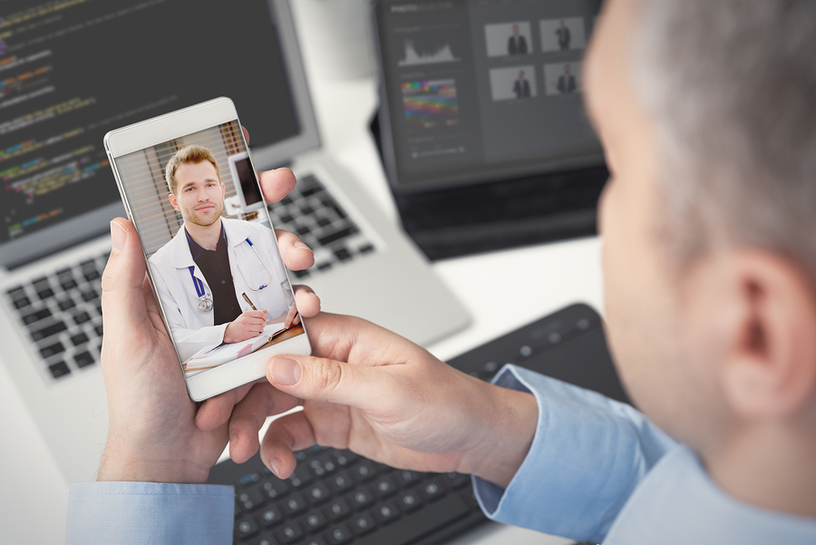 Telehealth conference via a phone.