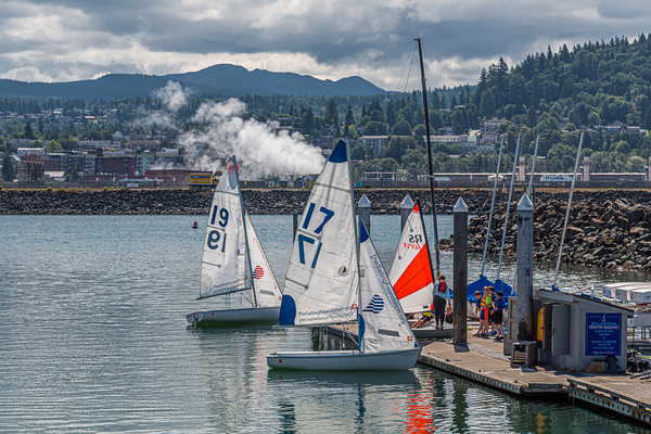 Sailboats in a harbor.