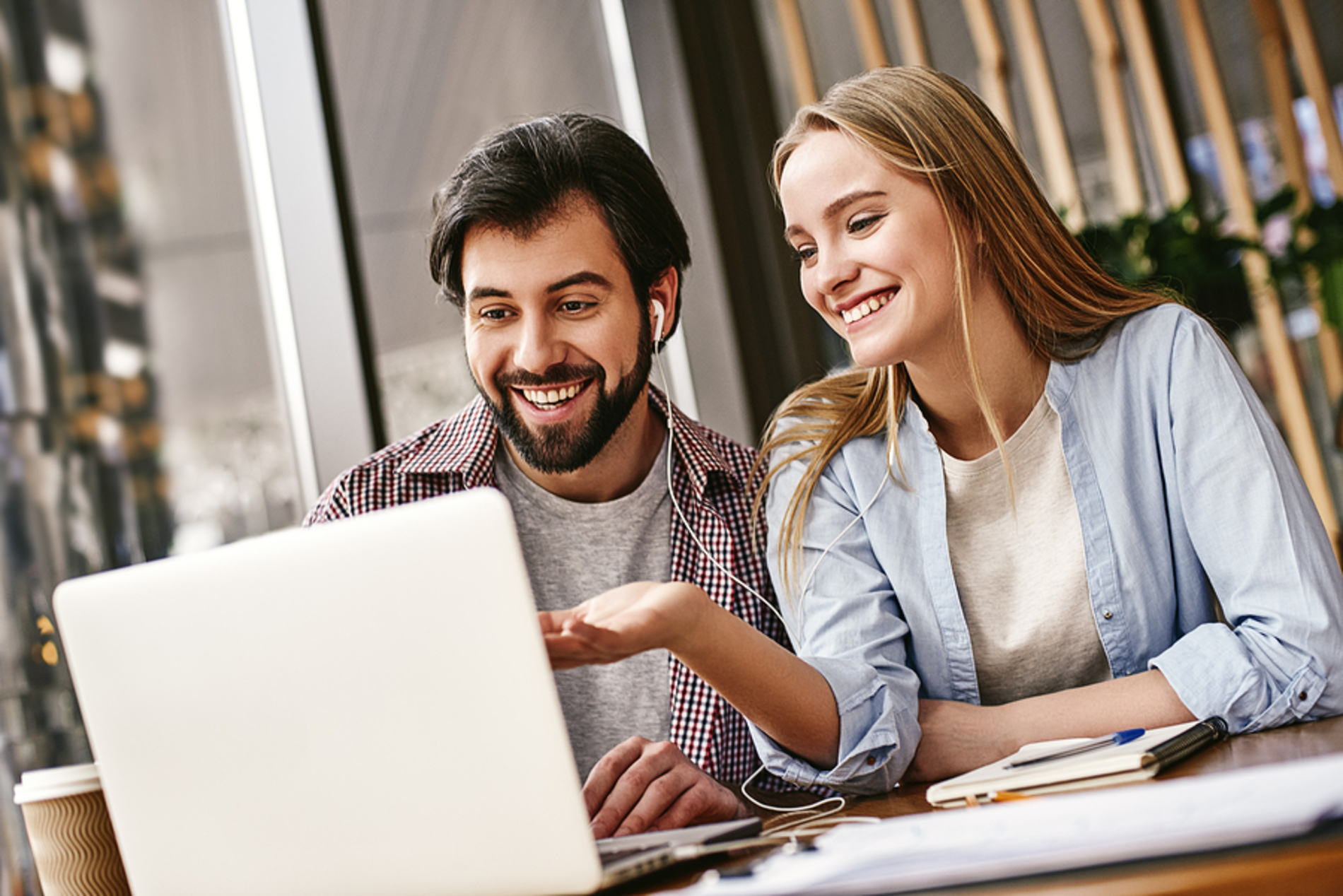 Couple looking at a laptop together.