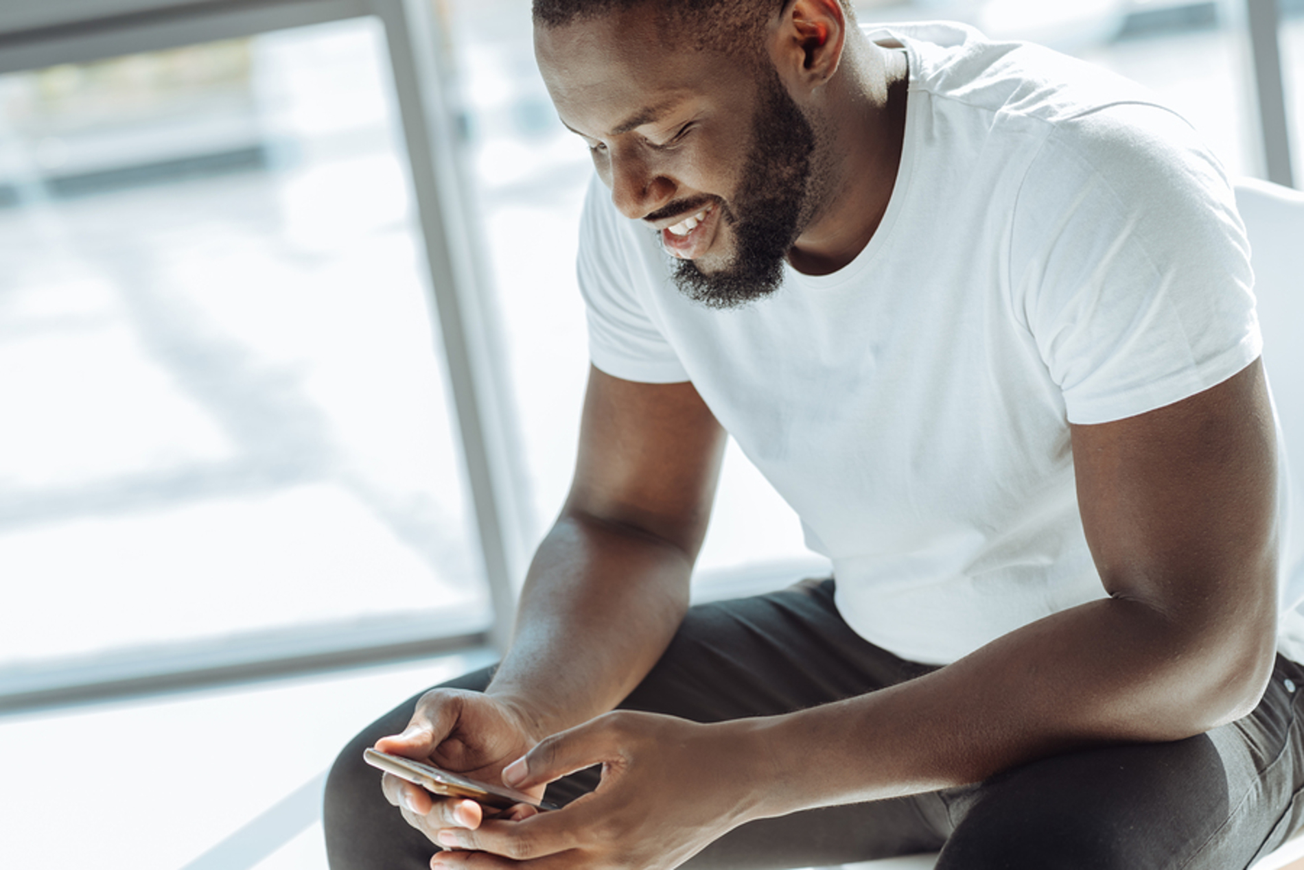 Man looking at his mobile phone.