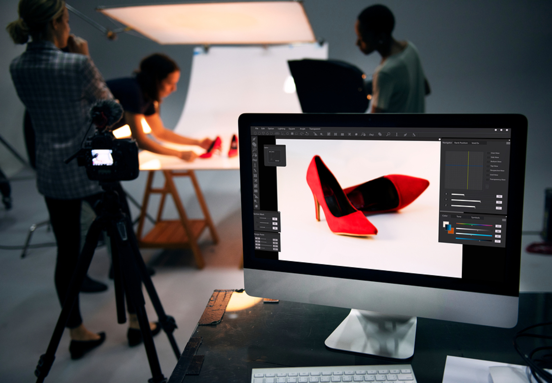 Photographer taking photos of shoes.