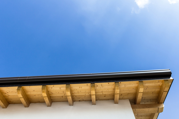 Black gutter on a building.