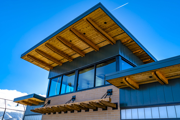 Modern building with large windows.