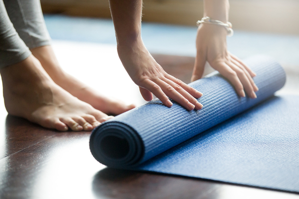 Unrolling yoga mat 