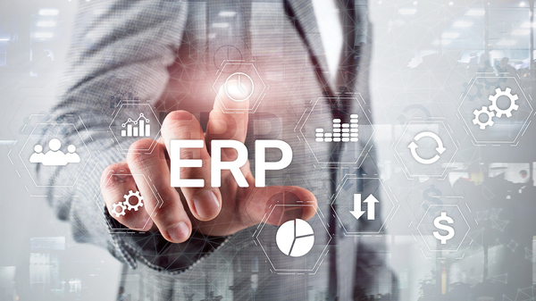 Man pointing to the letters ERP.
