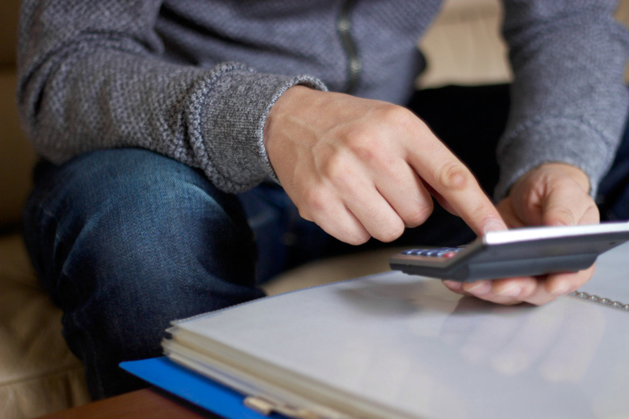 Using a calculator.