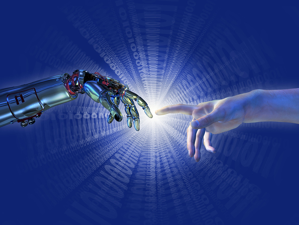 Robotic hand touching a human hand.