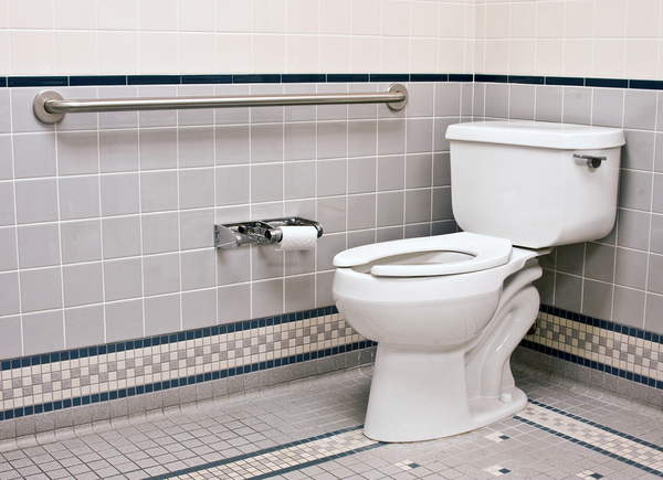 Bathroom with white toilet.