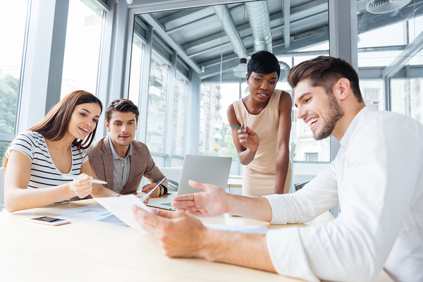 Group of colleagues discussing a project.