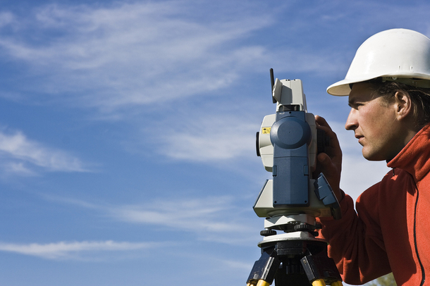 Land surveyor working on a project.