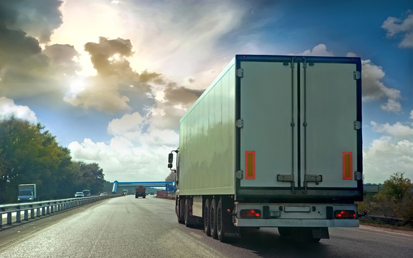 18 Wheeler truck on a highway.