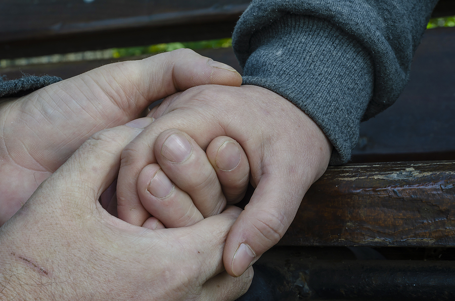 Holding hands.