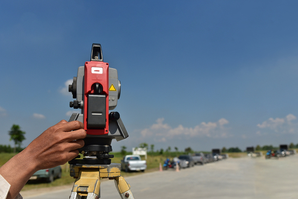 Survey equipment on a road.
