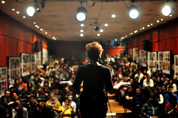 Presenting in front of a group.