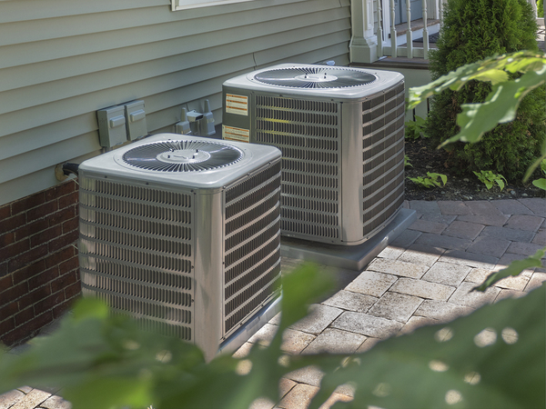 Two A/C units outside.