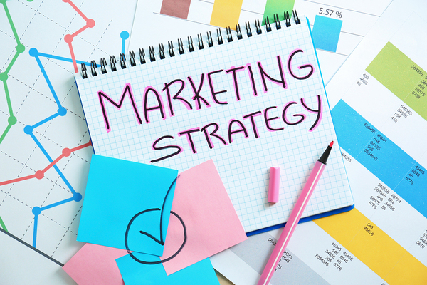 Notebook with the words Marketing Strategy.