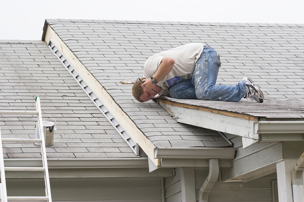 Person working on a roof.